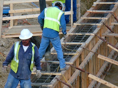 Construction workers on the Mission Reach of the River Walk Construction workers on the Mission Reach of the River Walk